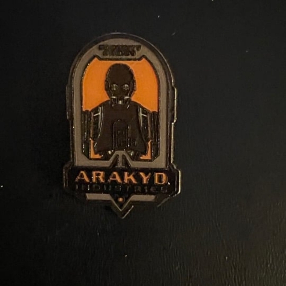 Star Wars Arakyd Industries Pin with Orange and Black